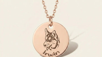 Rose gold necklace with a dog portrait and name engraved.