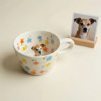Dog figurine mug displayed with pet photo