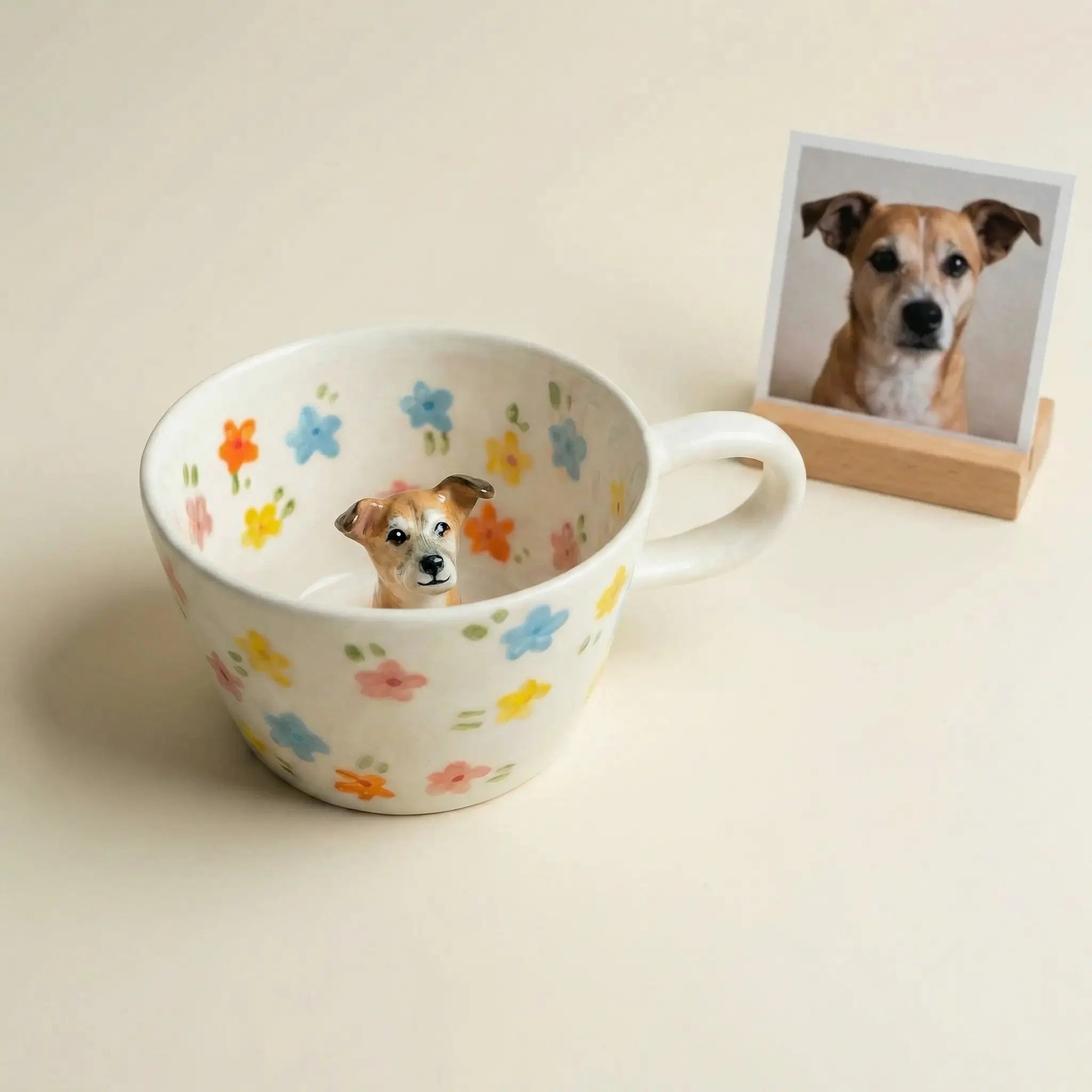 Dog figurine mug displayed with pet photo