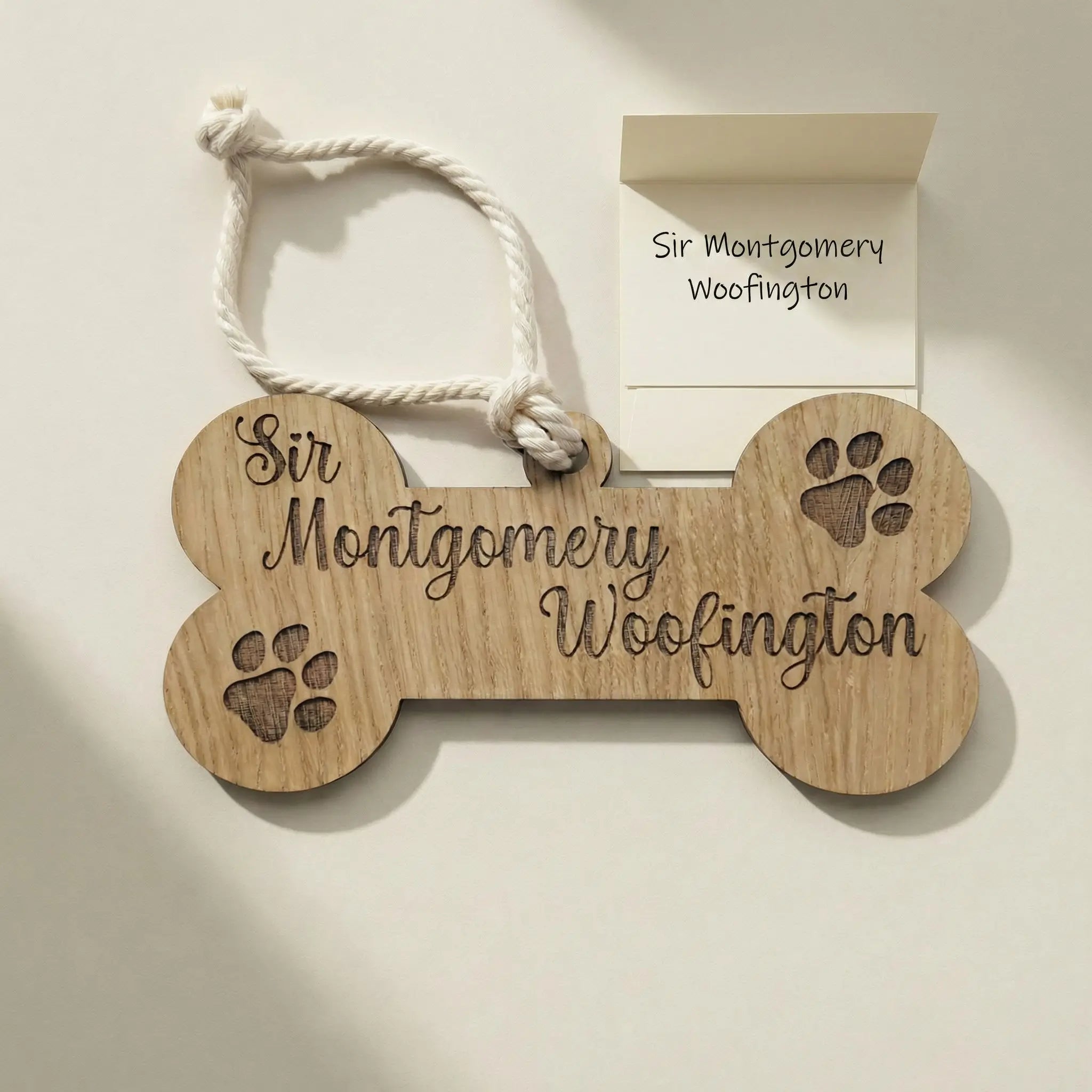 Dog bone memorial plaque displayed with gift card