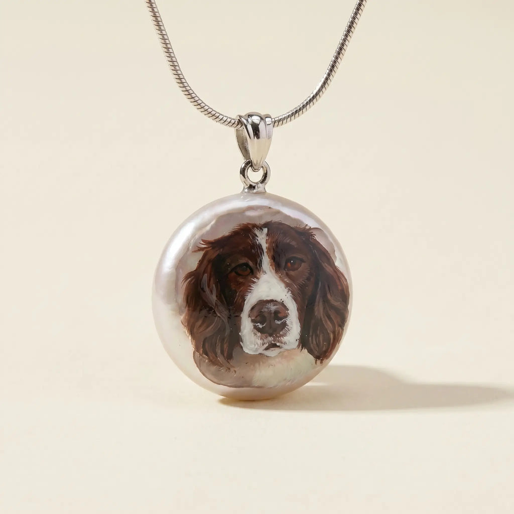 Round painted dog portrait pendant on necklace