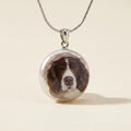 Round painted dog portrait pendant on necklace