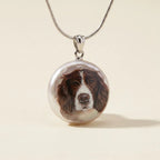 Round painted dog portrait pendant on necklace