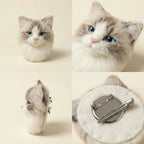 Detail views of cat needle felt brooch