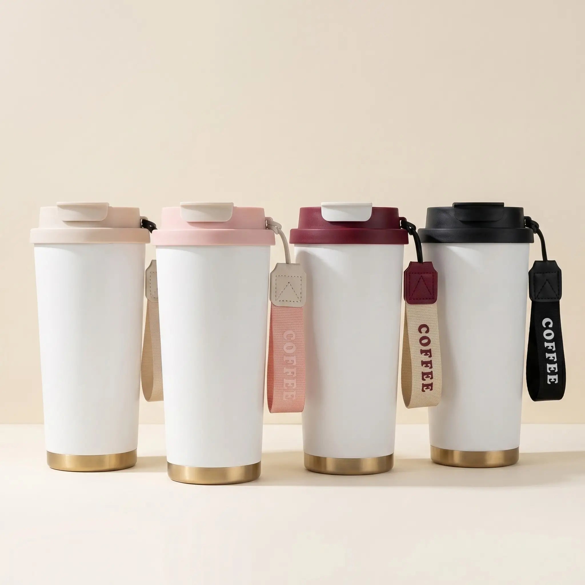 Assorted blank and colored reusable coffee cups