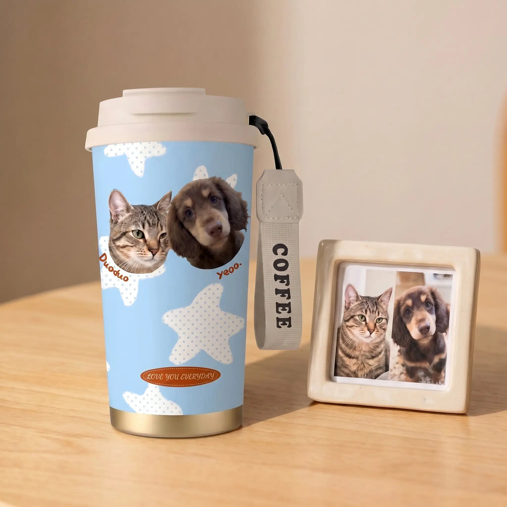Pet portrait coffee cup beside framed photo