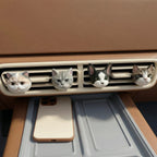 Pet face sculptures clipped on car vent
