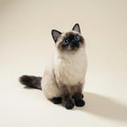 Realistic cat clone sculpture on neutral background