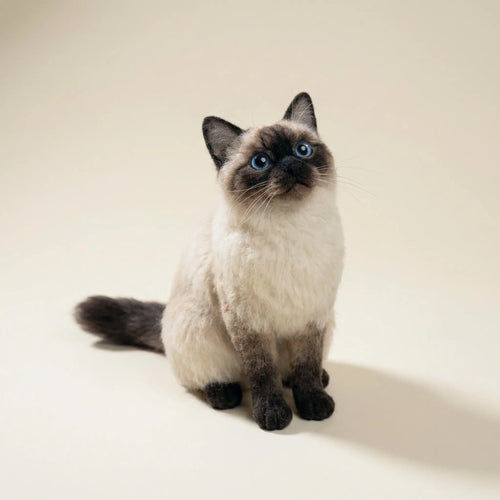 Realistic cat clone sculpture on neutral background