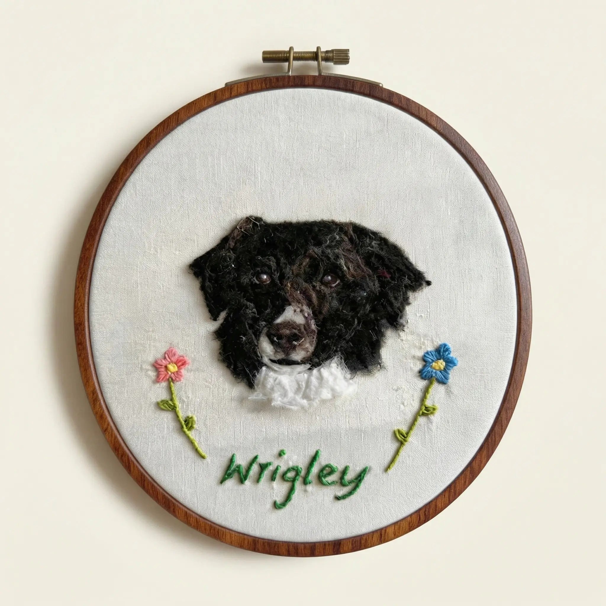 Black dog wool felt portrait in embroidery hoop