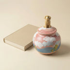 Pet urn displayed beside memorial book