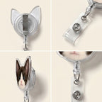 Detail views of cat face badge reel