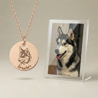 Pet portrait necklace displayed beside dog photo
